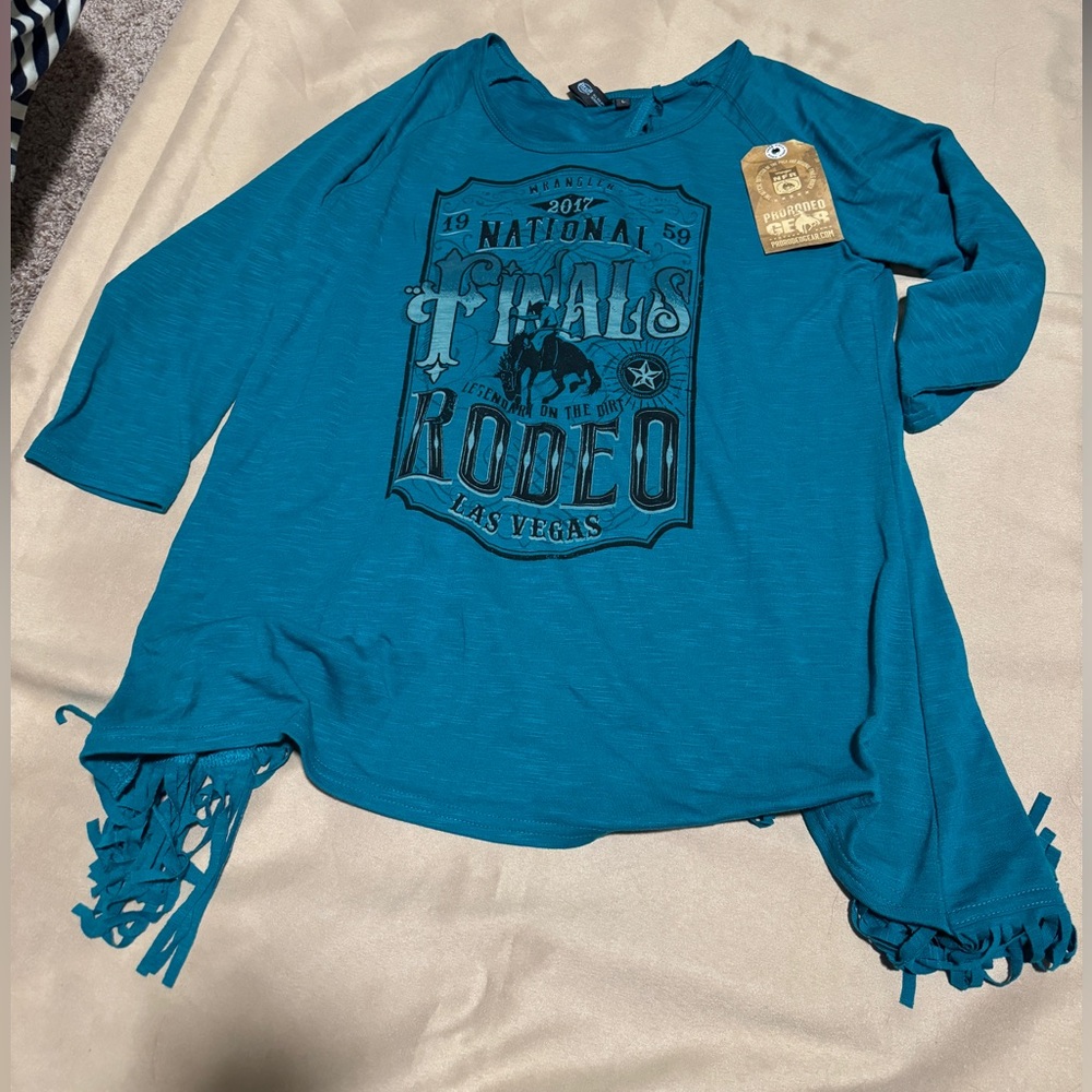 Teal “National Finals Rodeo” fringe tee